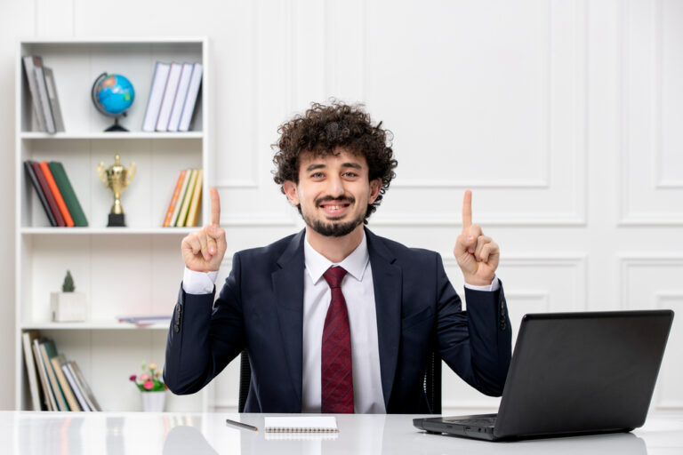 customer-service-curly-brunette-young-man-office-suit-red-tie-with-laptop-excited (1)